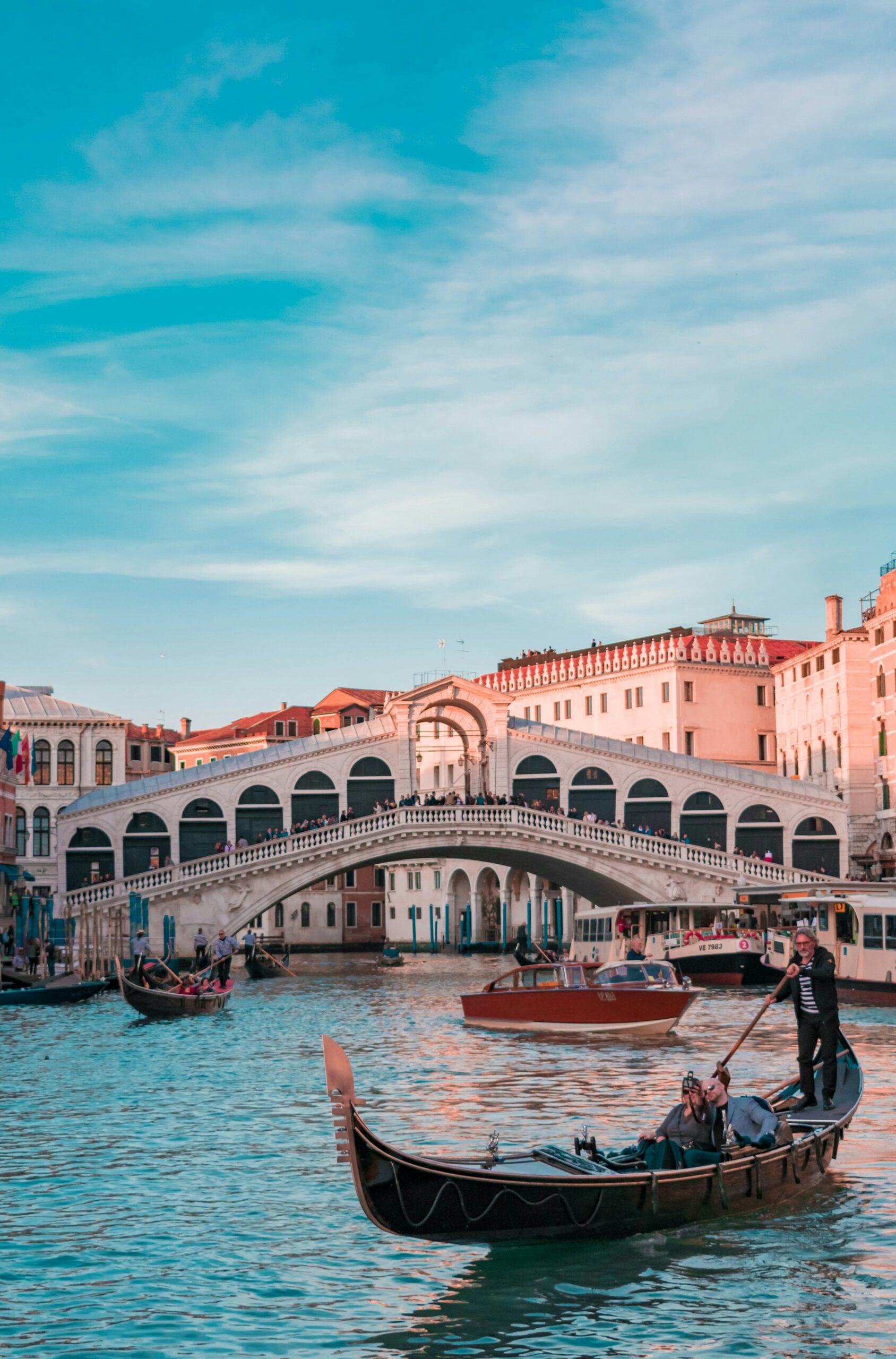 Gondolas on a Venice canal at golden hour